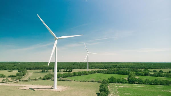 wind turbines over fields (c) Thomas Reaubourg unsplash